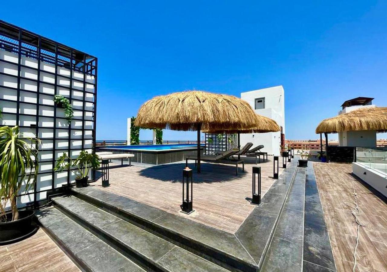 Sanctuary Sunlit Hurghada Haven With 4 Pools, Rooftop Sunsets & Gourmet Bites Steps Away Exterior photo